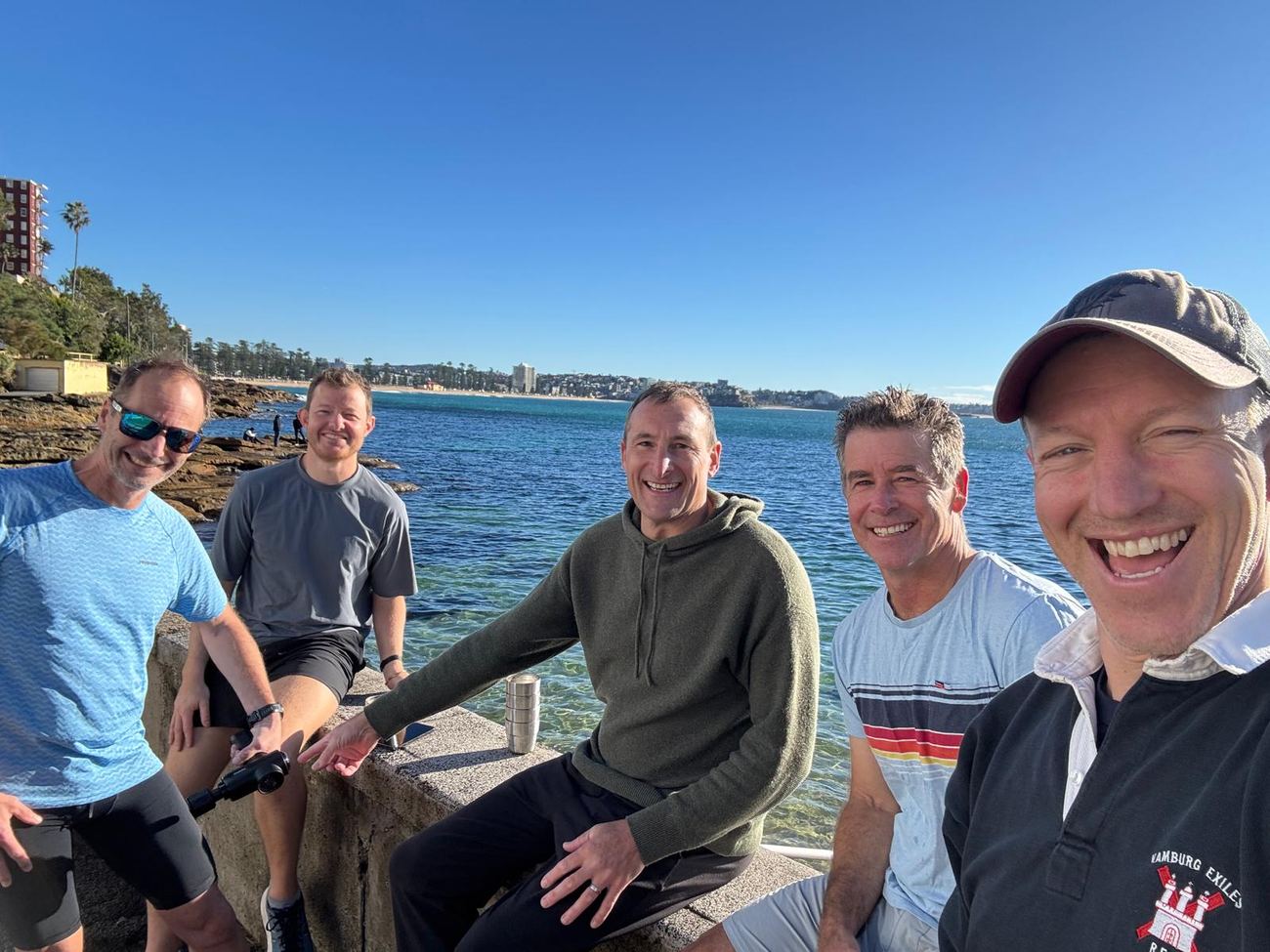 Five on the wall, Manly behind